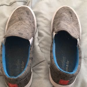 Brand new never worn grey slip on shoes